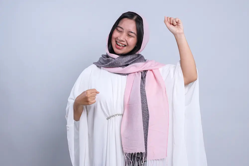 Joyfull woman wearing cotton hijab